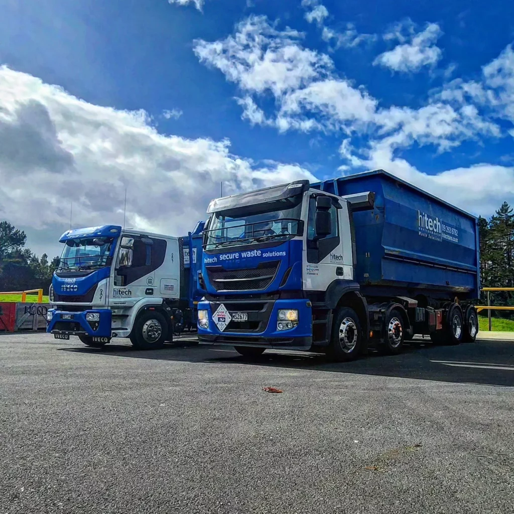 photo of Hitech Disposals blue and white trucks