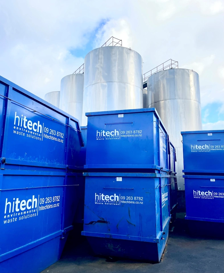 big blue hi tech bins stacked two layers tall